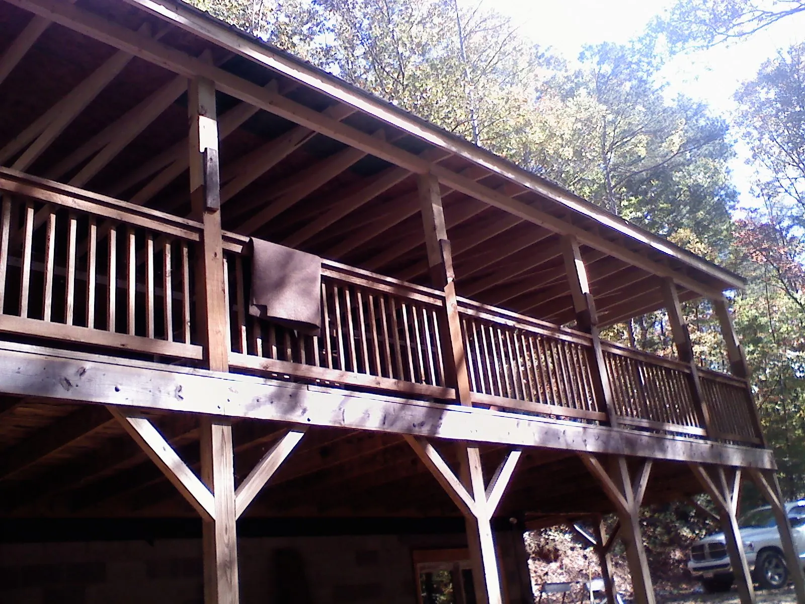 Timber framing under a new elevated porch and deck — Roof Leak Repair in New Bloomington by Roofing Brothers